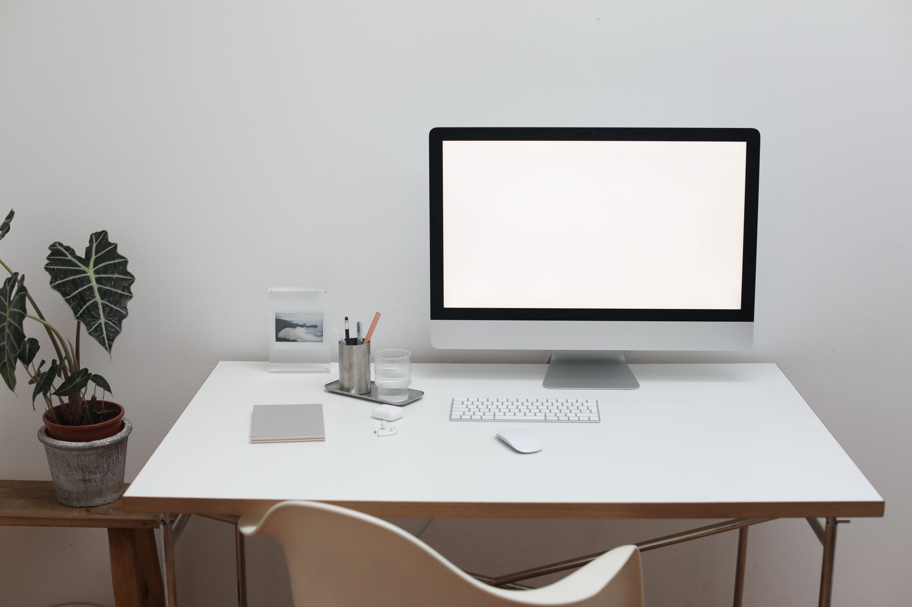 contemporary workplace with office supplies and computer